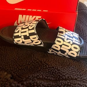 Brand new Nike slides. Both male and female can wear them unisex
